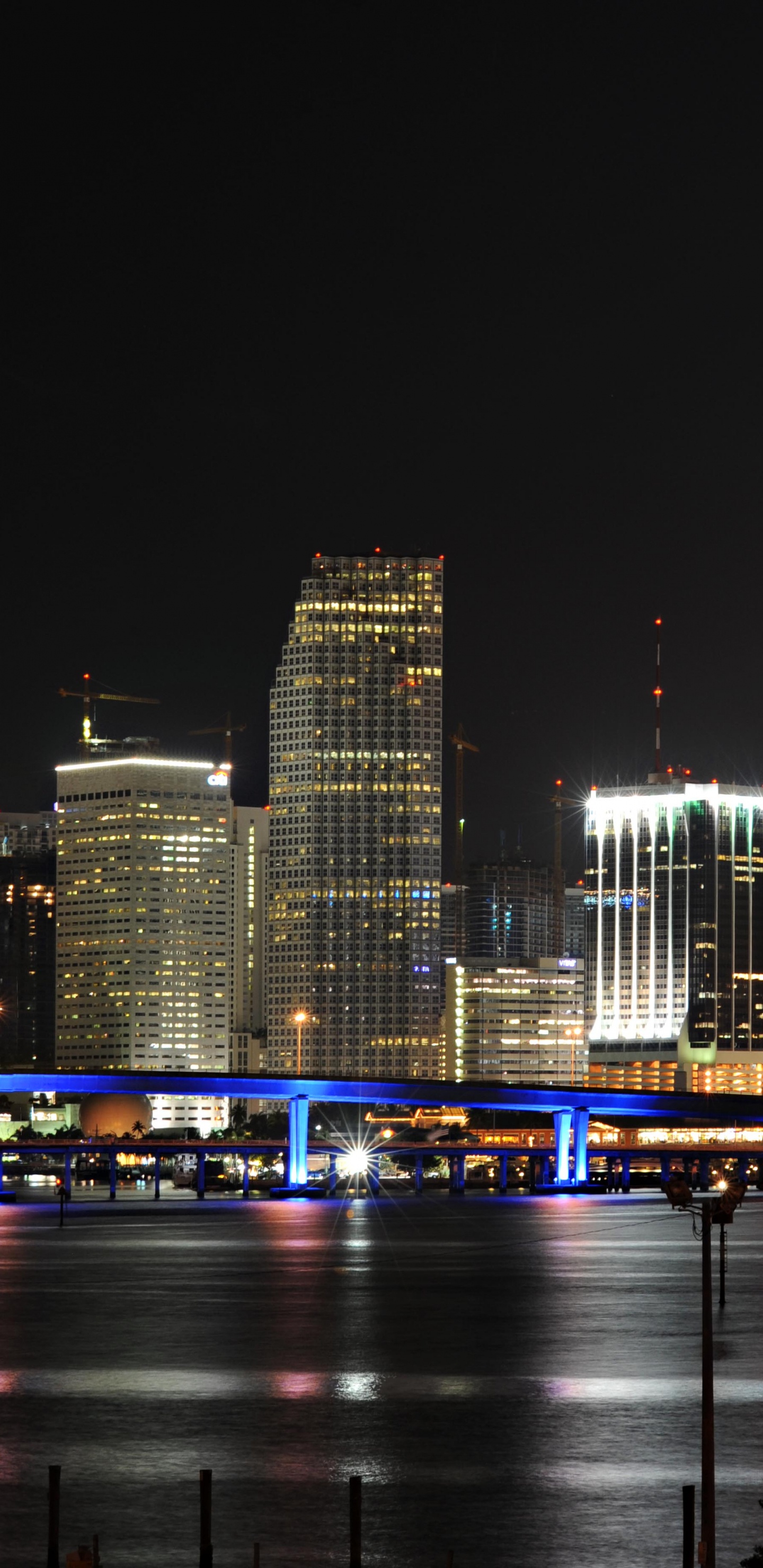 City Skyline During Night Time. Wallpaper in 1440x2960 Resolution