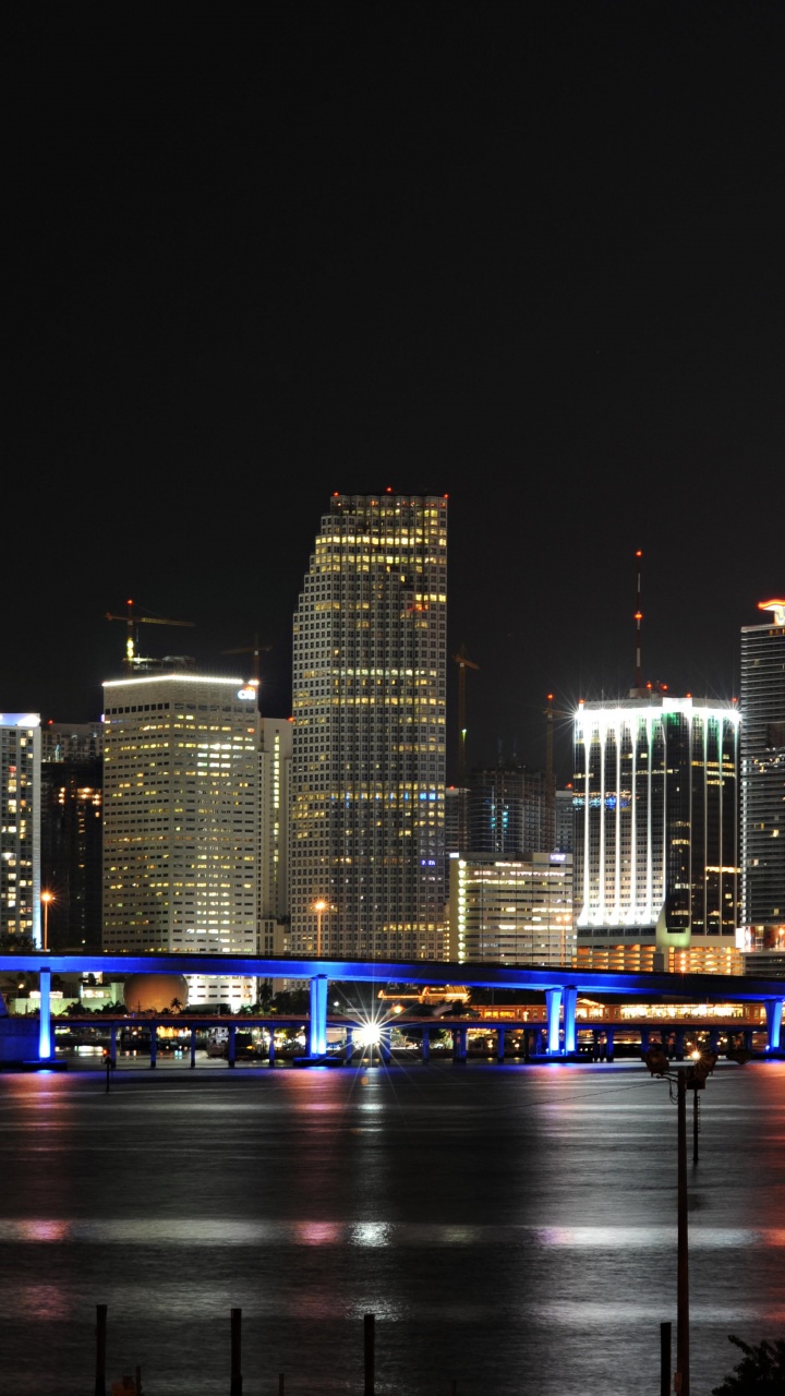 City Skyline During Night Time. Wallpaper in 720x1280 Resolution