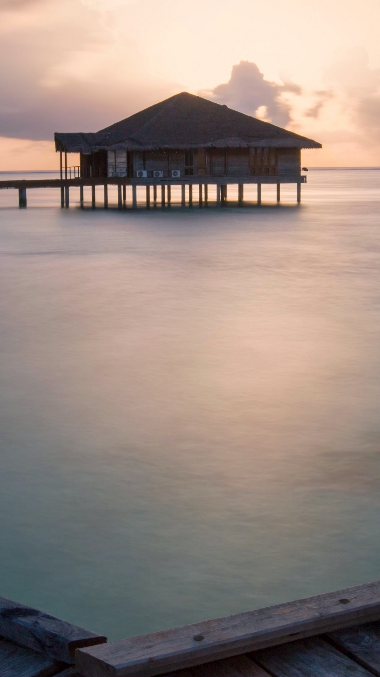 Brown Wooden Dock on Body of Water During Daytime. Wallpaper in 1440x2560 Resolution