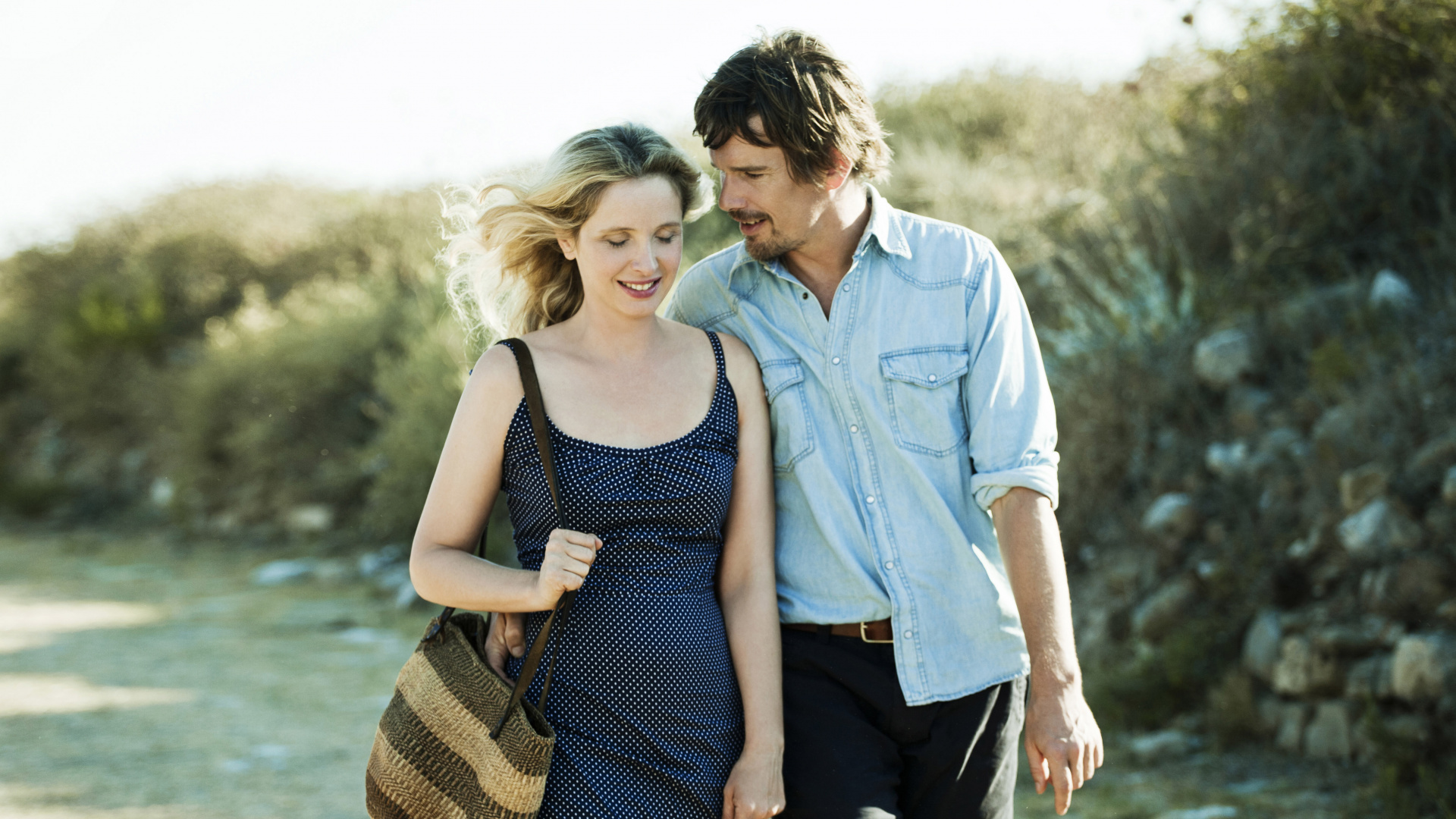 Man in Blue Dress Shirt and Woman in Black Tank Top Standing on Seashore During Daytime. Wallpaper in 1920x1080 Resolution