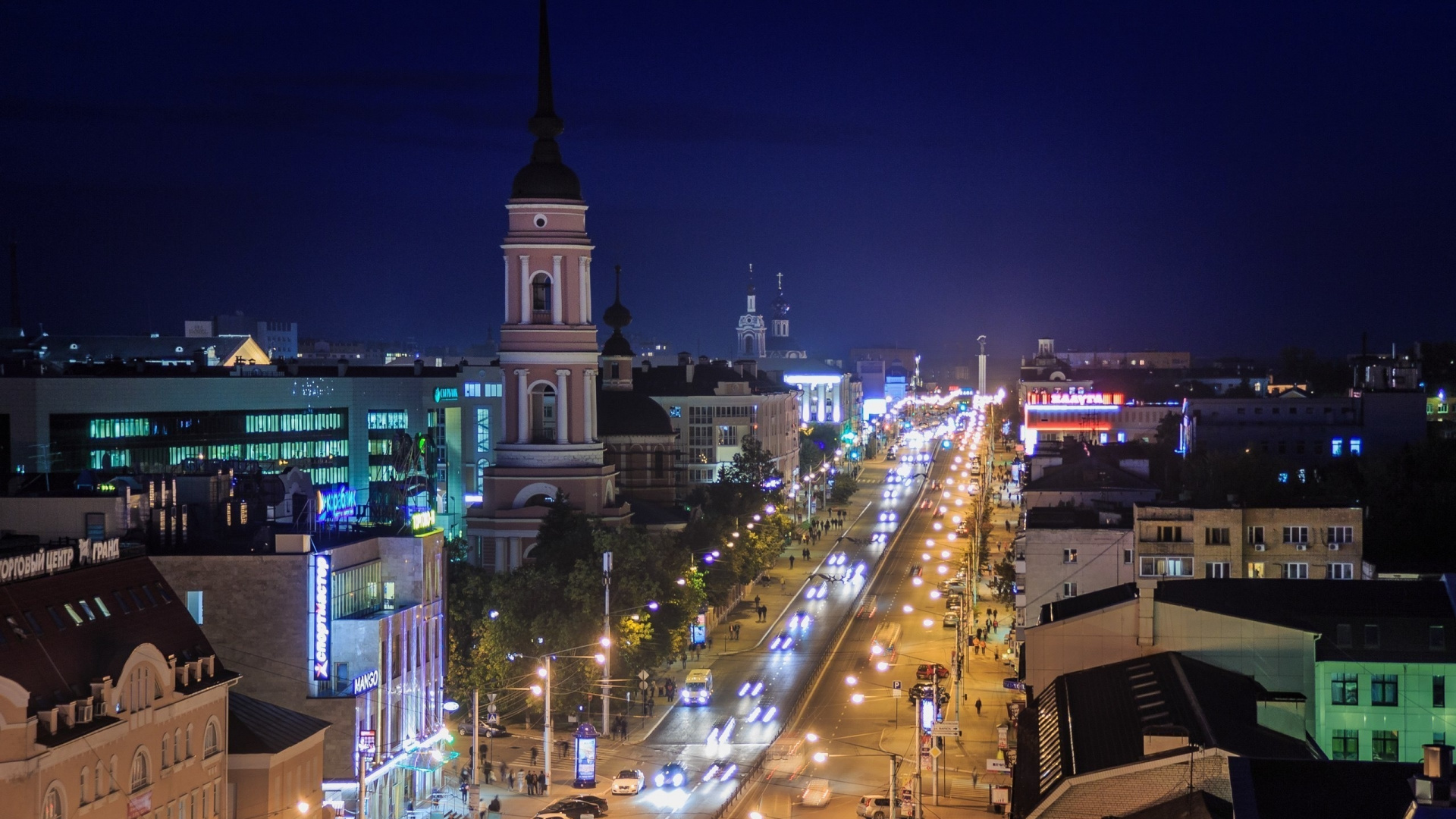 Cars on Road Between High Rise Buildings During Night Time. Wallpaper in 1920x1080 Resolution