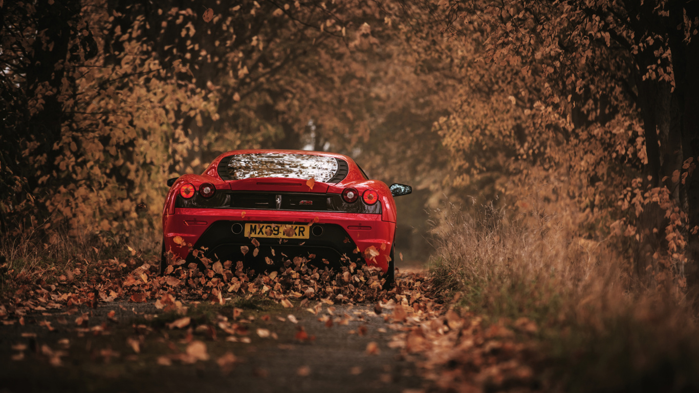 Voiture Rouge Sur Terrain D'herbe Brune Pendant la Journée. Wallpaper in 1366x768 Resolution