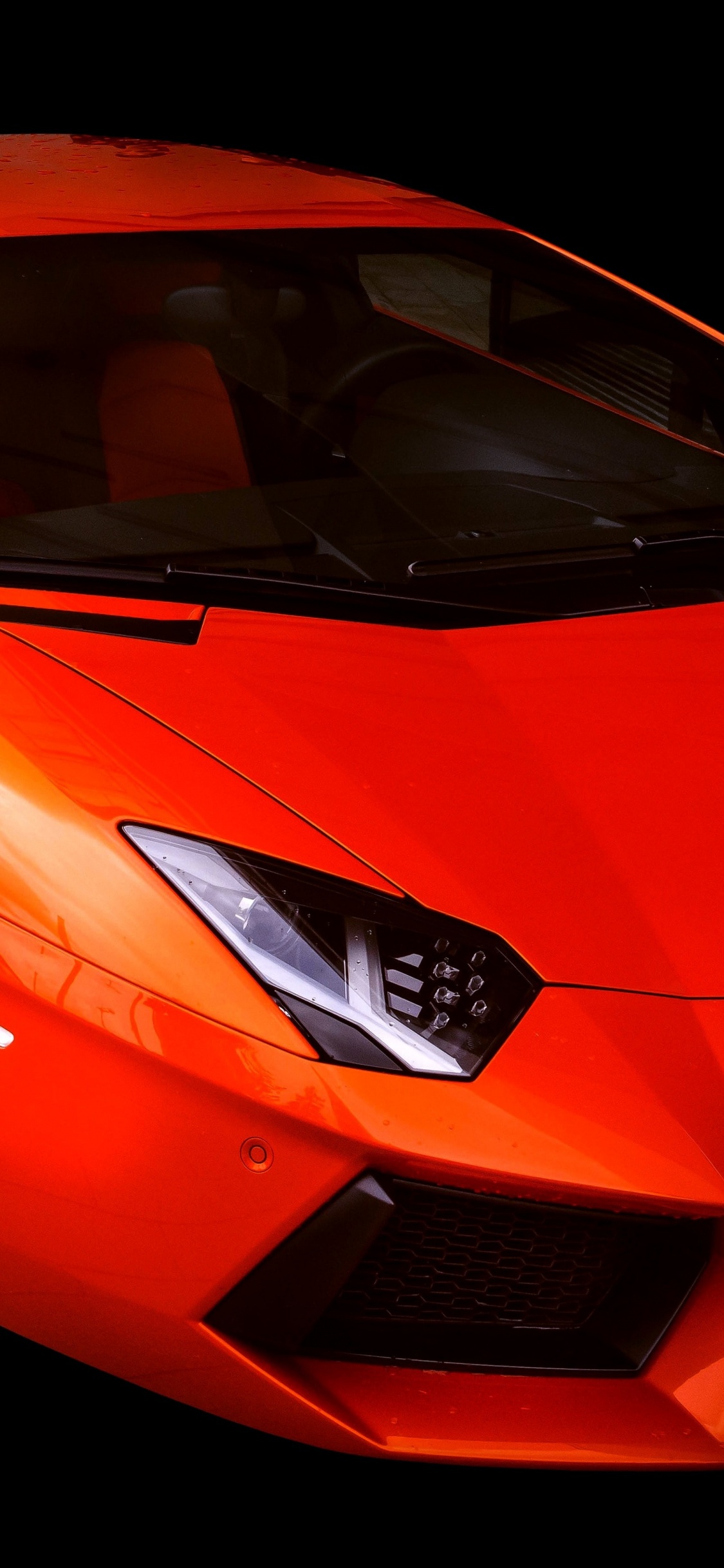 Roter Ferrari 458 Italia Auf Schwarzem Hintergrund. Wallpaper in 1125x2436 Resolution