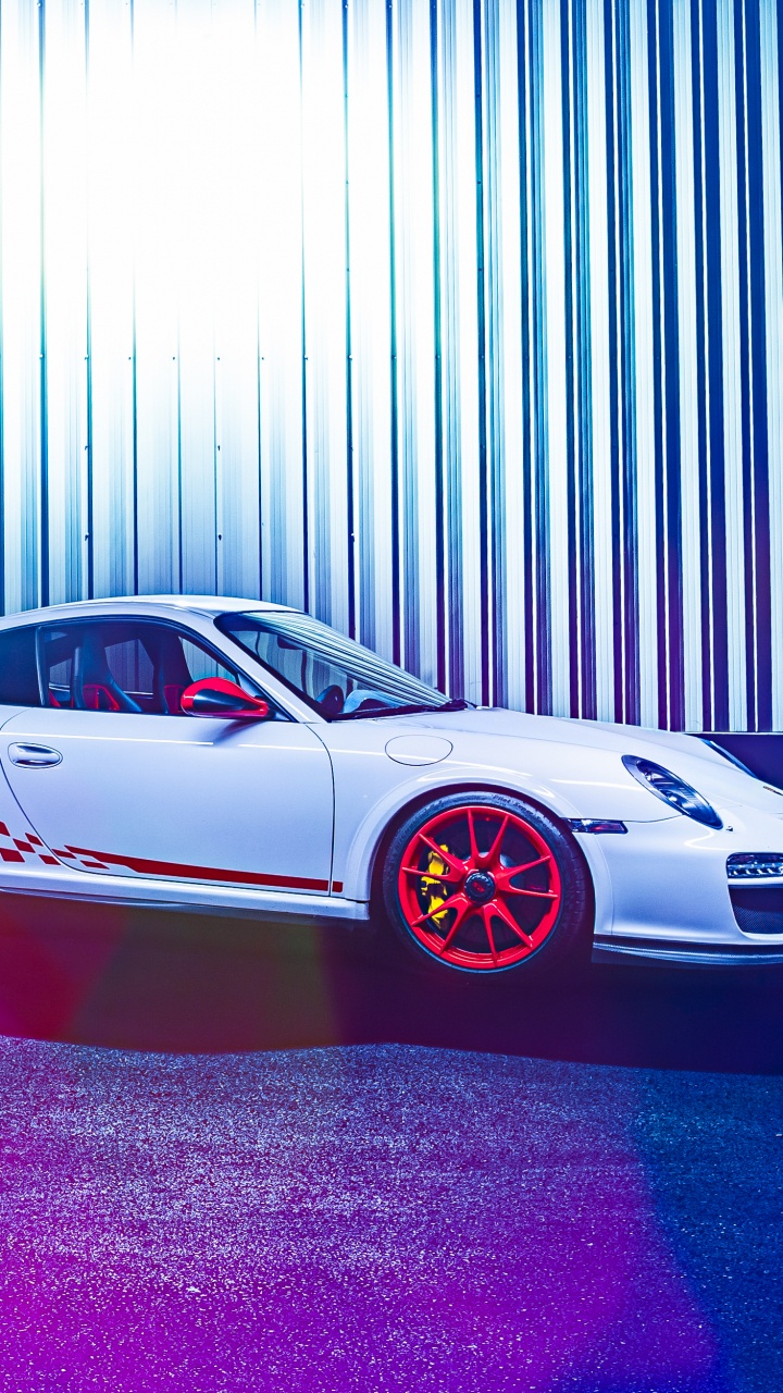 Red Coupe in a Garage. Wallpaper in 720x1280 Resolution