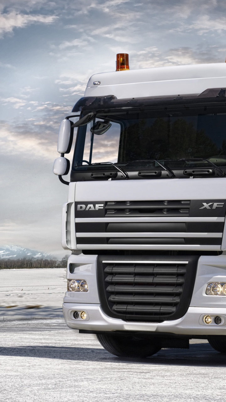 White and Red Freight Truck on Road During Daytime. Wallpaper in 720x1280 Resolution