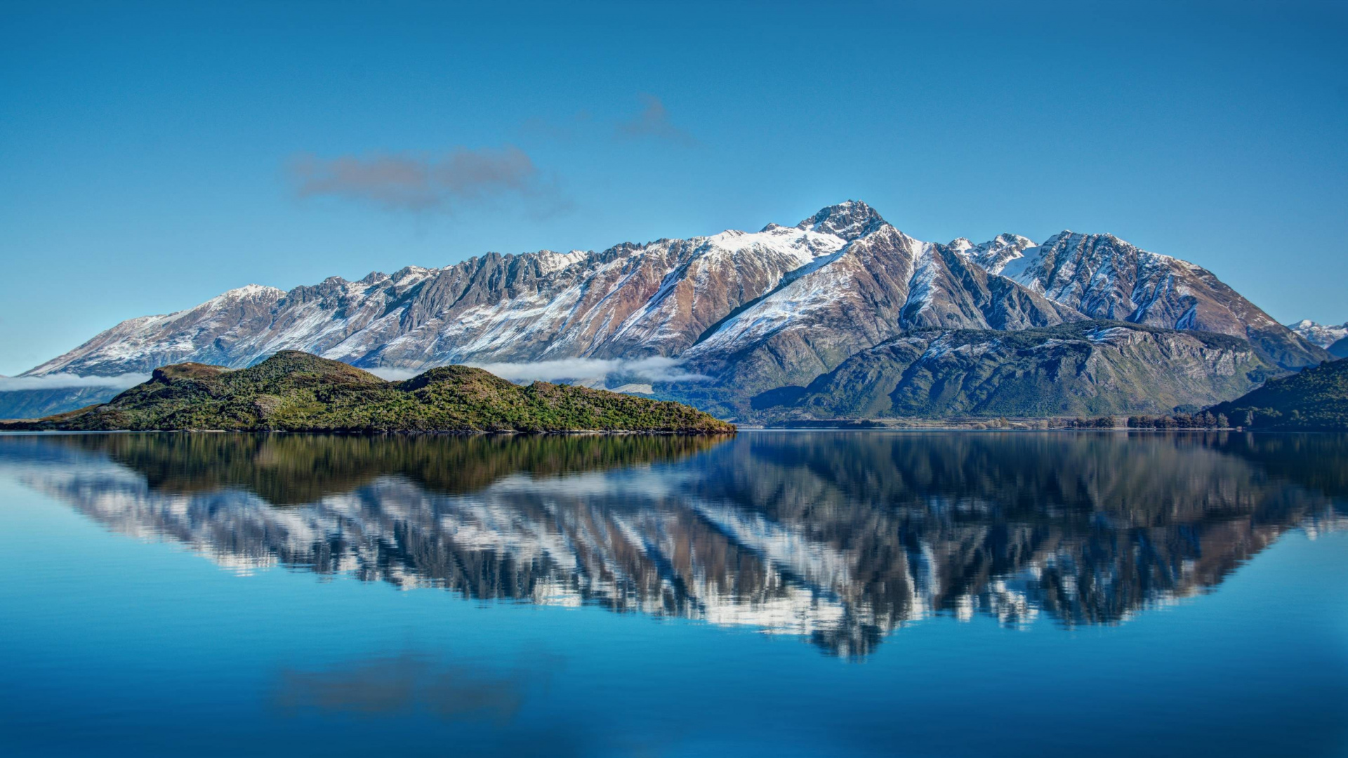 Snow Covered Mountain Near Lake During Daytime. Wallpaper in 1920x1080 Resolution