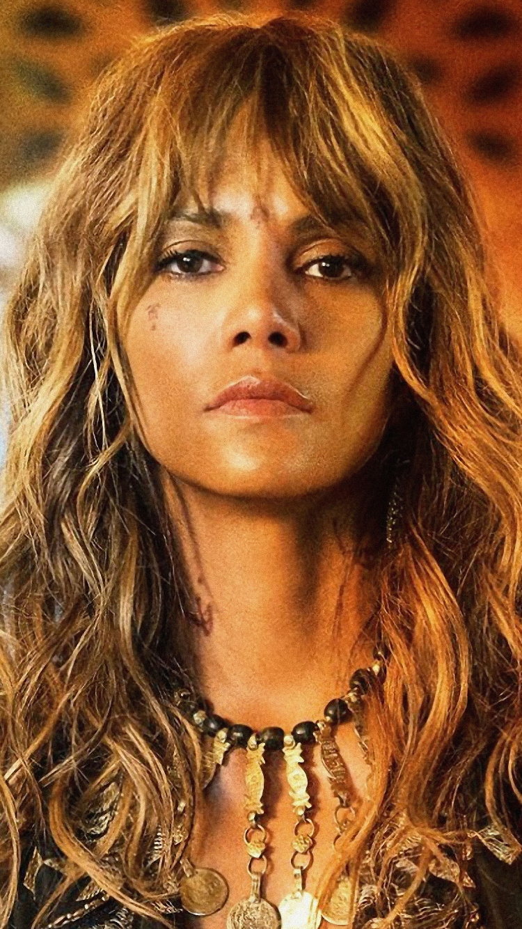 Woman in Brown and Black Shirt. Wallpaper in 750x1334 Resolution