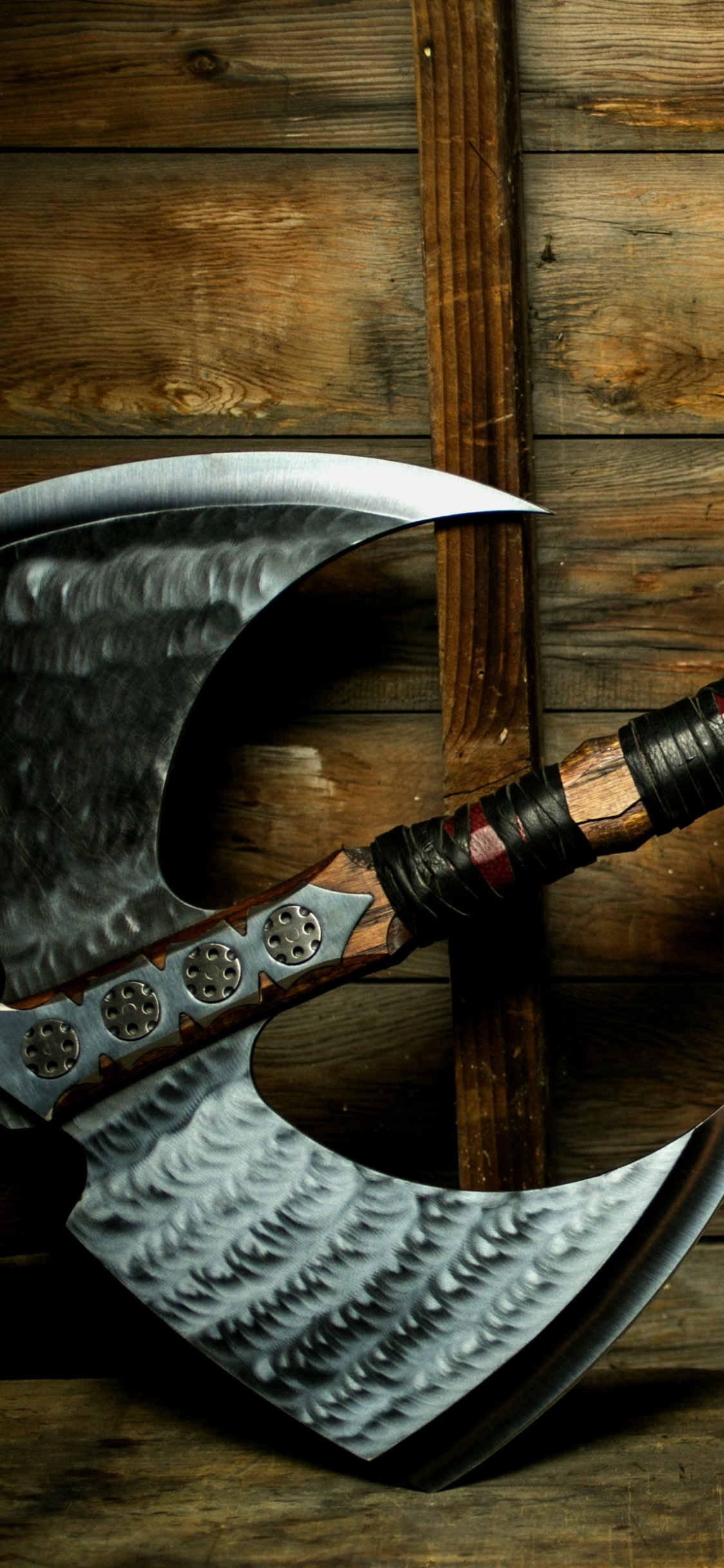 Red and Black Metal Pipe on Brown Wooden Surface. Wallpaper in 1125x2436 Resolution