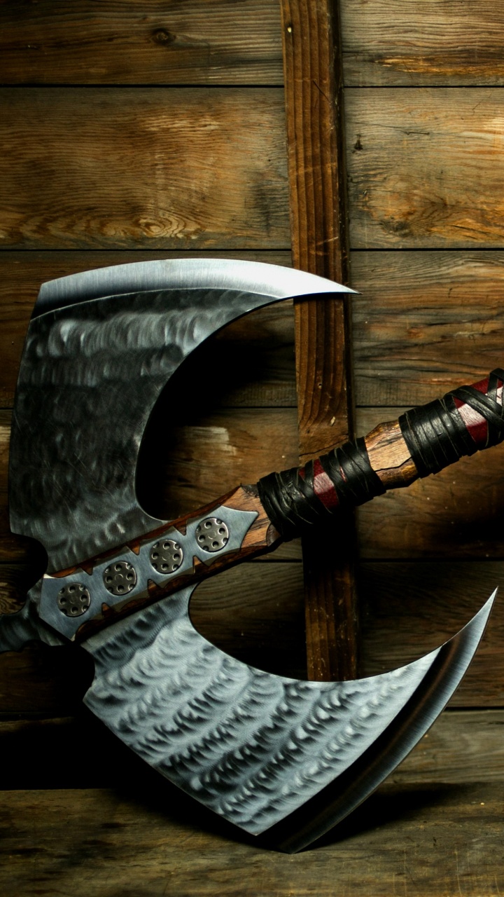 Red and Black Metal Pipe on Brown Wooden Surface. Wallpaper in 720x1280 Resolution