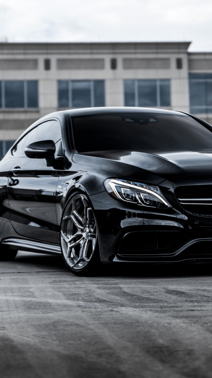 Black Mercedes Benz Coupe in a Room. Wallpaper in 720x1280 Resolution