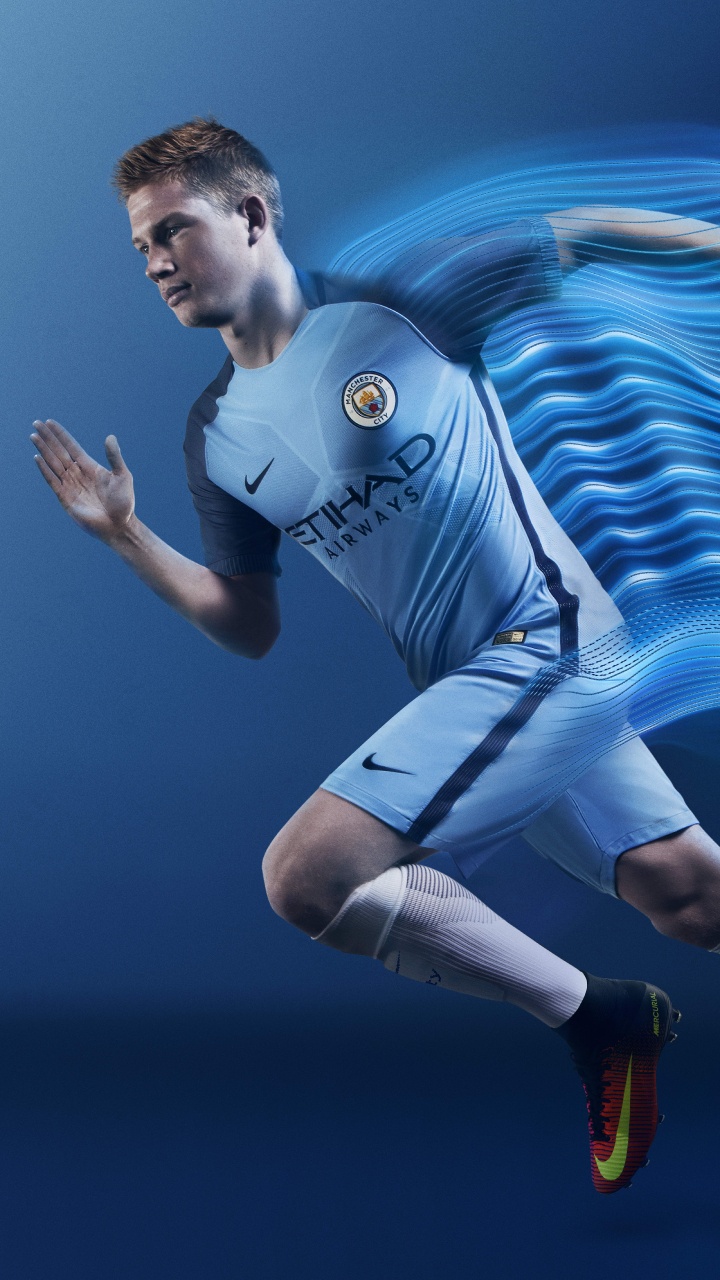 Man in Blue and White Jersey Shirt and Blue Denim Jeans. Wallpaper in 720x1280 Resolution