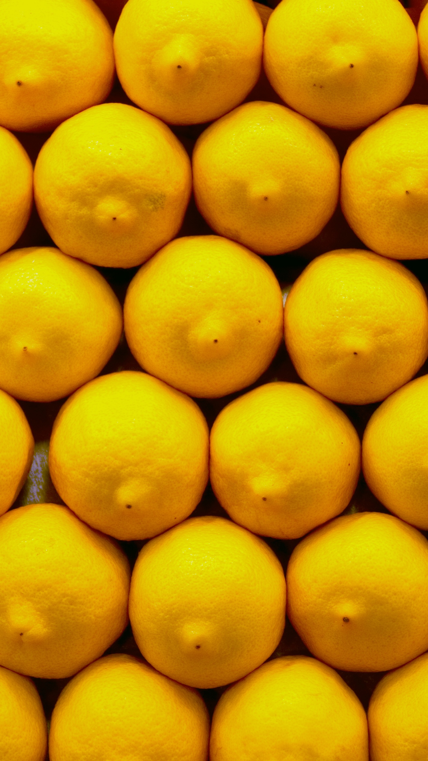 Yellow Lemon Fruit on Black Surface. Wallpaper in 1440x2560 Resolution