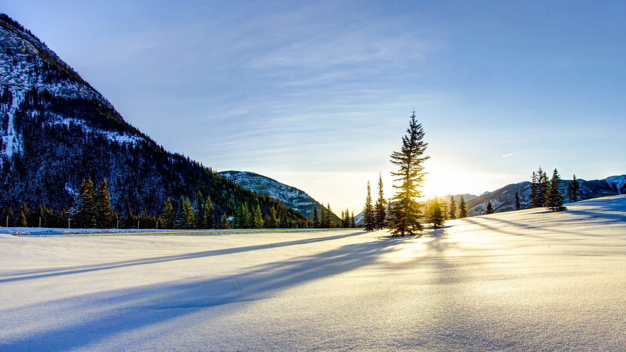Snow Covered Road Near Trees and Mountains During Daytime. Wallpaper in 1280x720 Resolution