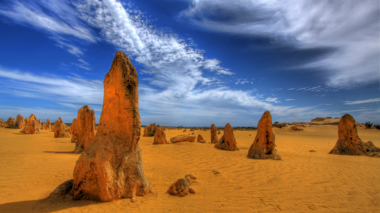 Brown Rock Formation Under Blue Sky and White Clouds During Daytime. Wallpaper in 1280x720 Resolution