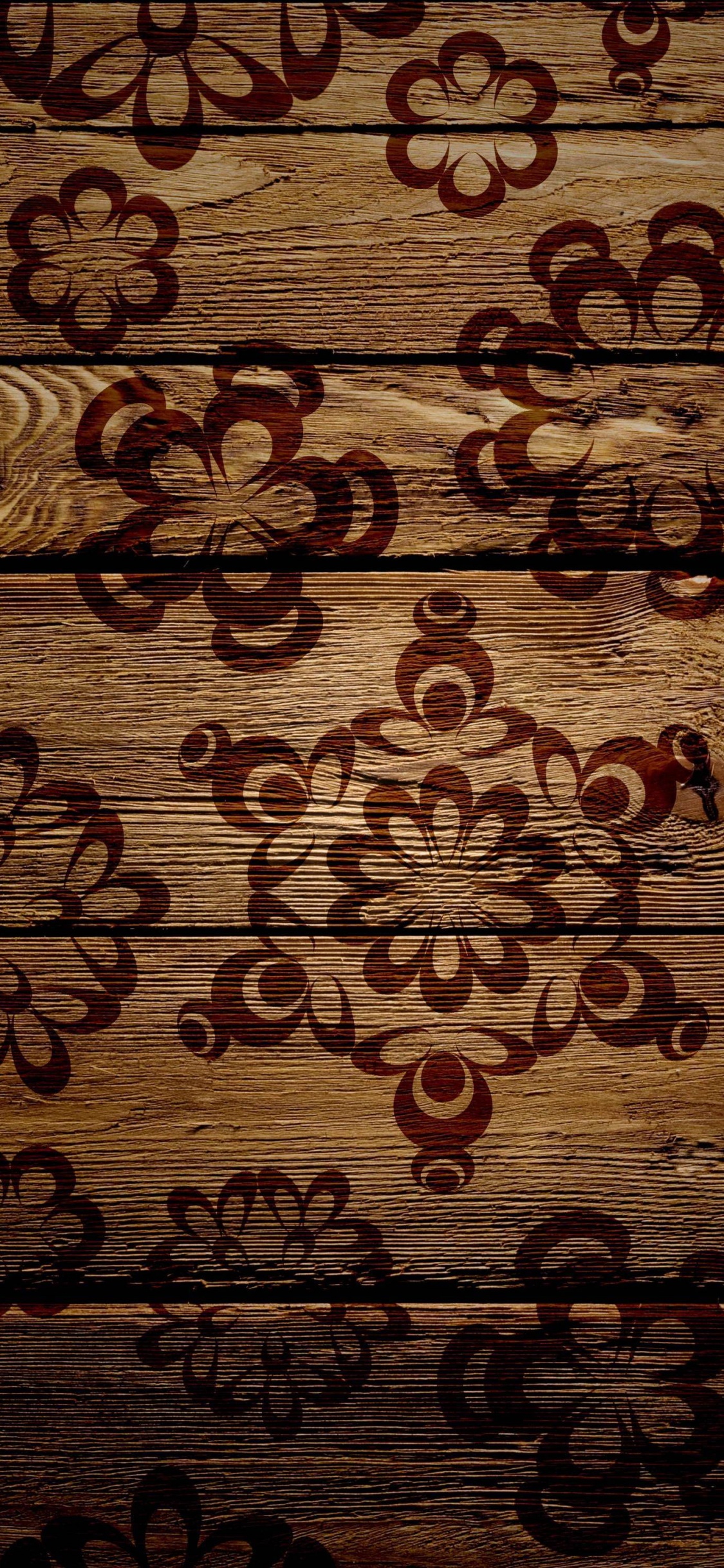 Braunes Und Schwarzes Holzbrett. Wallpaper in 1125x2436 Resolution