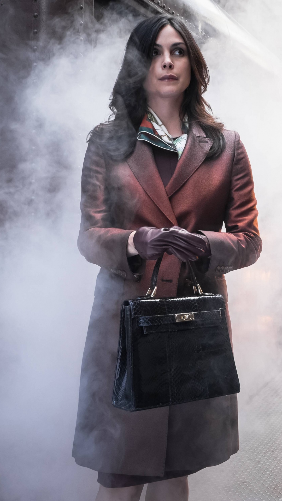 Woman in Brown Coat Standing on Gray Concrete Pavement. Wallpaper in 1080x1920 Resolution