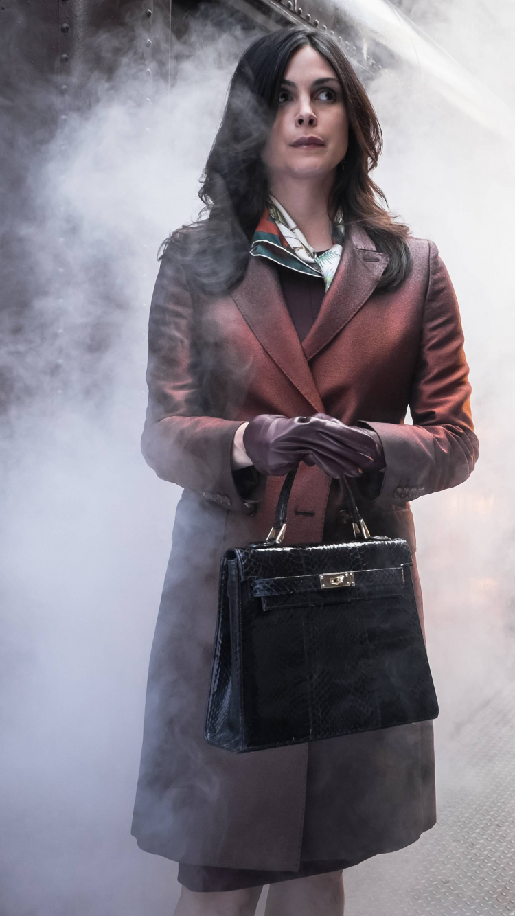 Woman in Brown Coat Standing on Gray Concrete Pavement. Wallpaper in 750x1334 Resolution