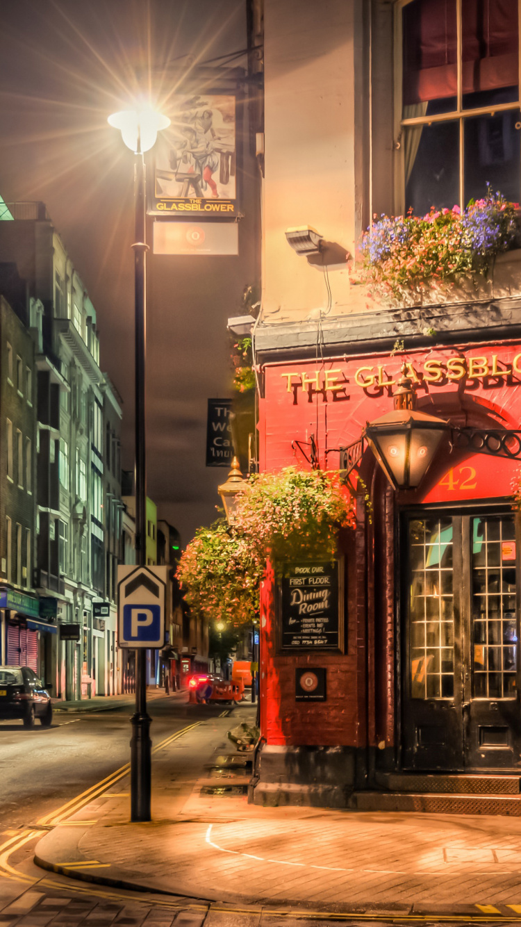 Bâtiment en Béton Brun et Blanc Pendant la Nuit. Wallpaper in 750x1334 Resolution