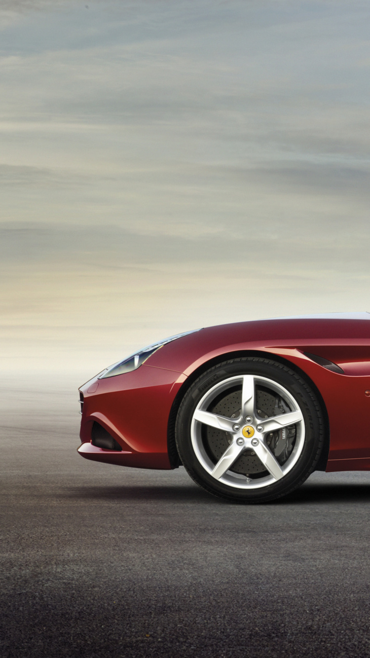 Red Convertible Coupe on Gray Asphalt Road During Daytime. Wallpaper in 750x1334 Resolution