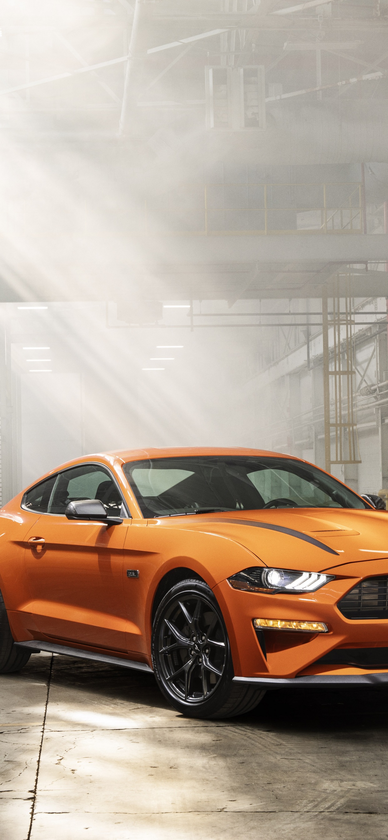 Orange Bmw m 3 Coupé Garé Sur Route. Wallpaper in 1242x2688 Resolution