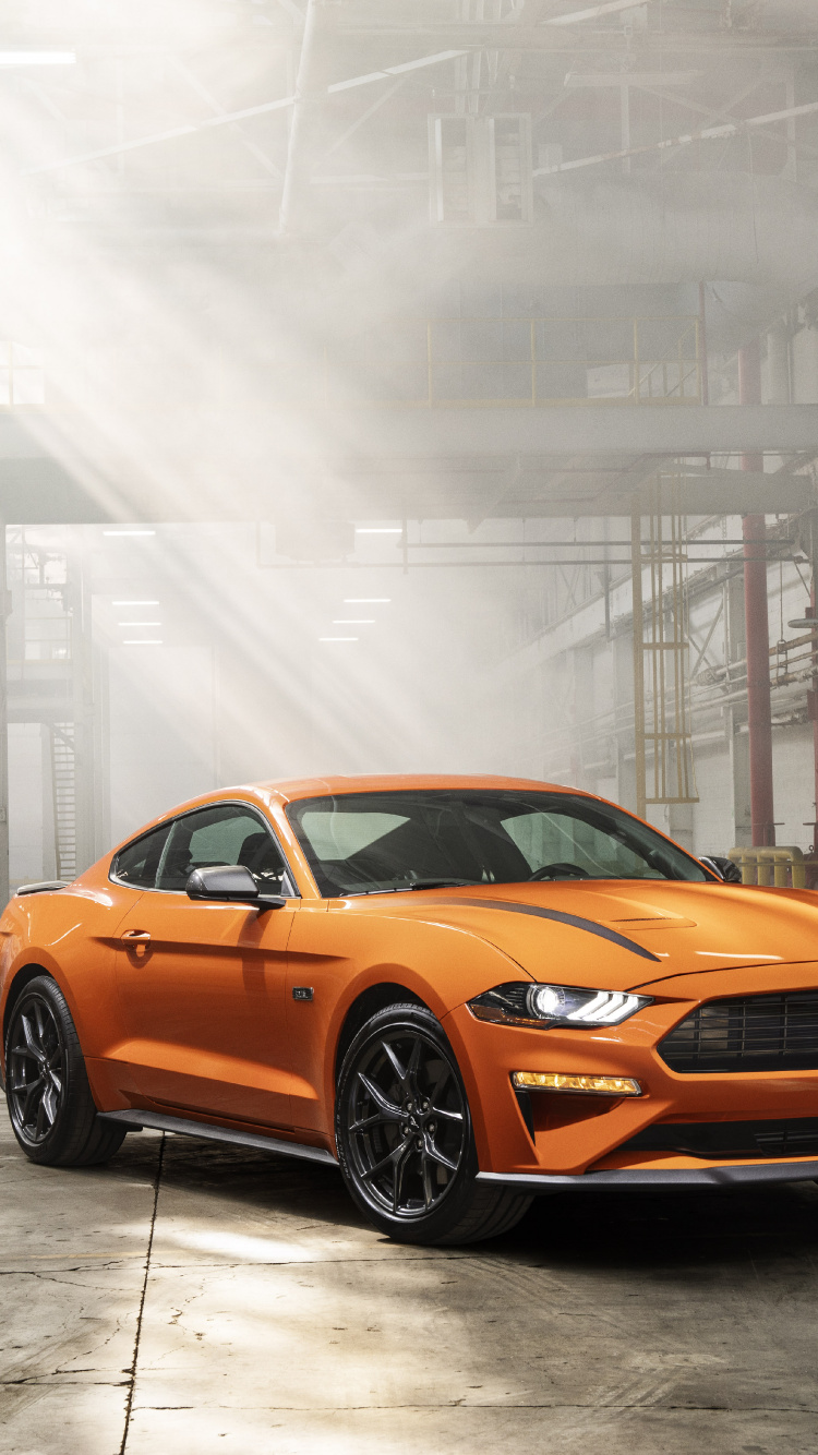 Orange Bmw m 3 Coupe Parked on Road. Wallpaper in 750x1334 Resolution