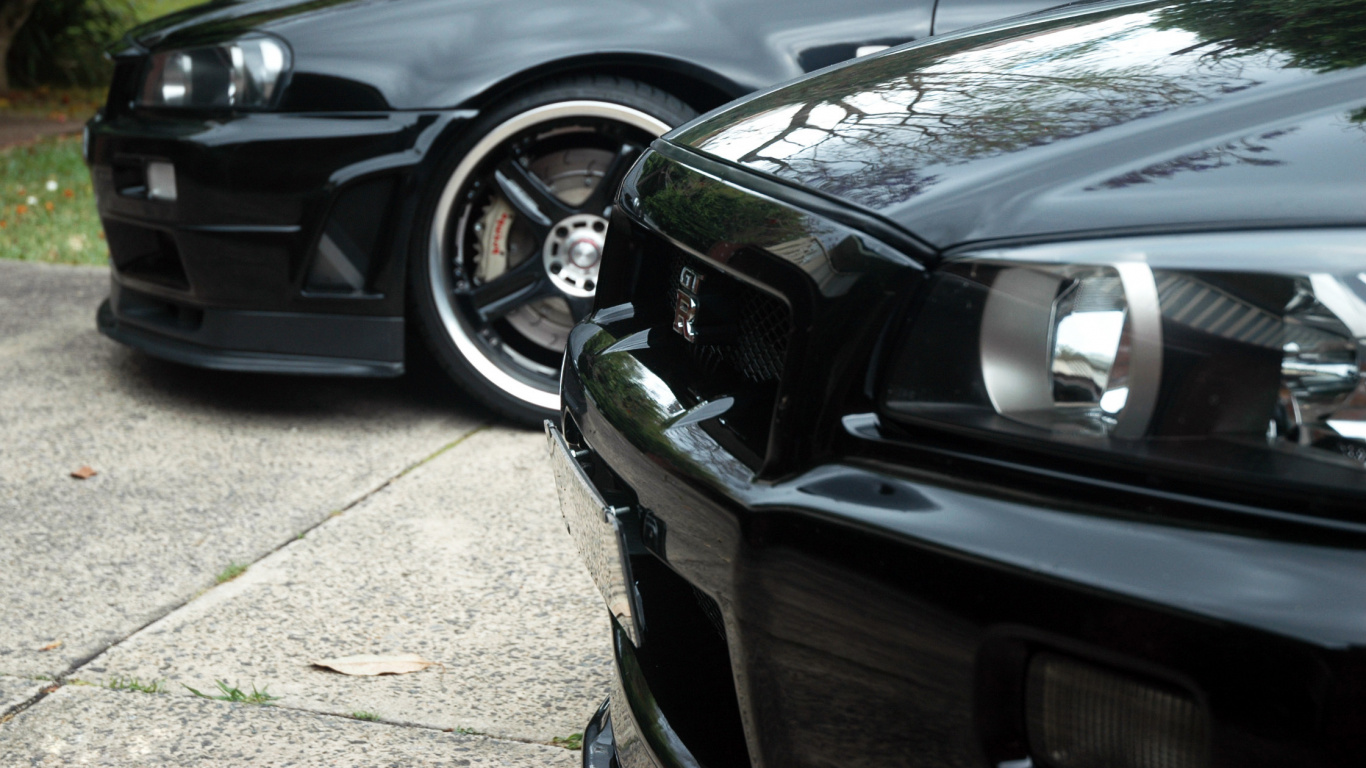 Coche Negro Sobre Piso de Concreto Gris. Wallpaper in 1366x768 Resolution