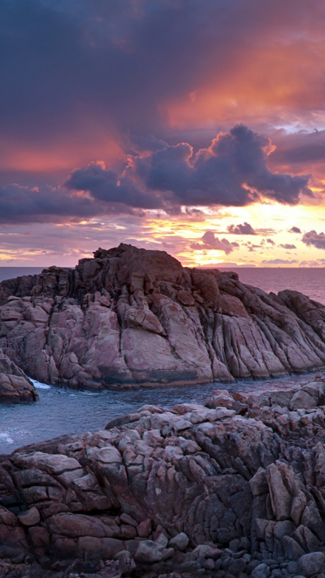 Brown Rock Formation Near Body of Water During Sunset. Wallpaper in 1080x1920 Resolution