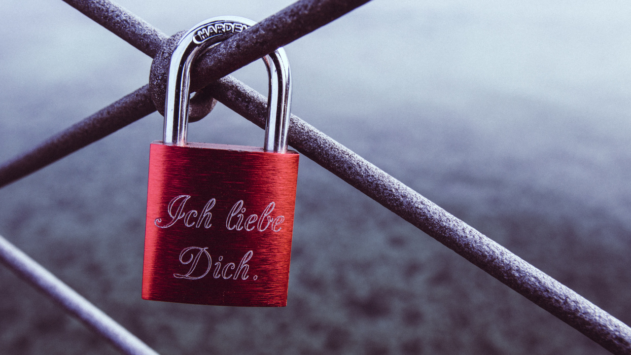 Red and Silver Padlock on Gray Metal Fence. Wallpaper in 1280x720 Resolution