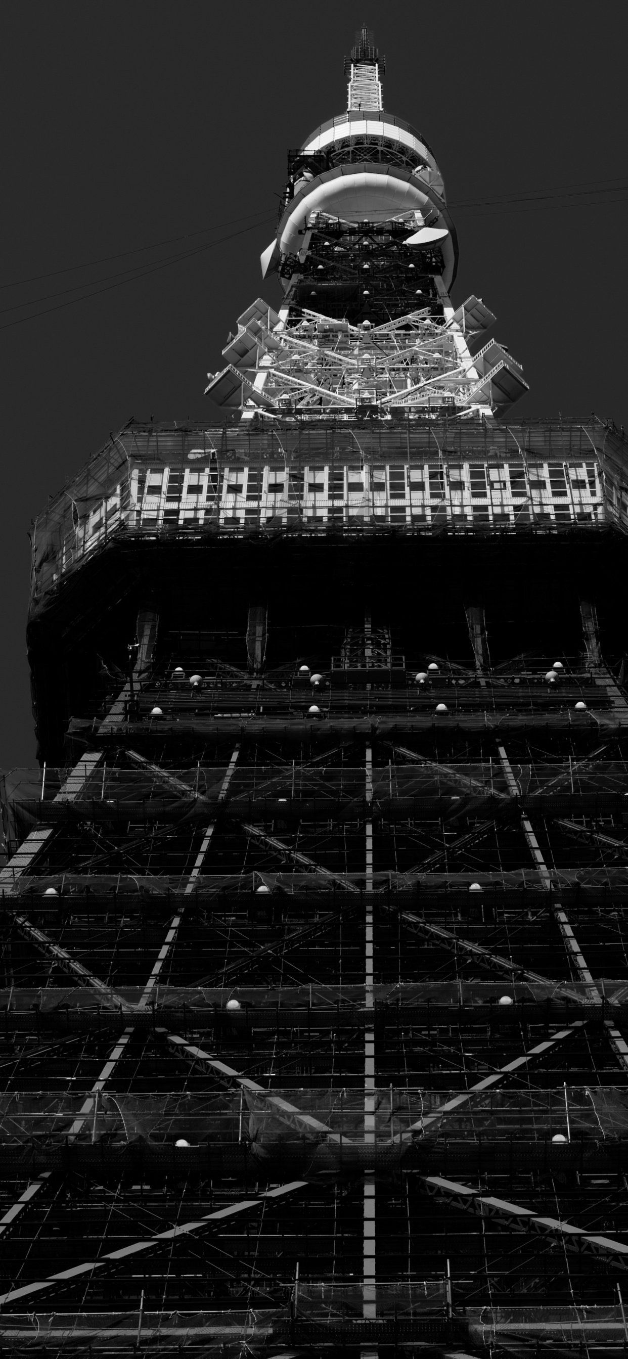 Black and White Tower With Lights. Wallpaper in 1242x2688 Resolution