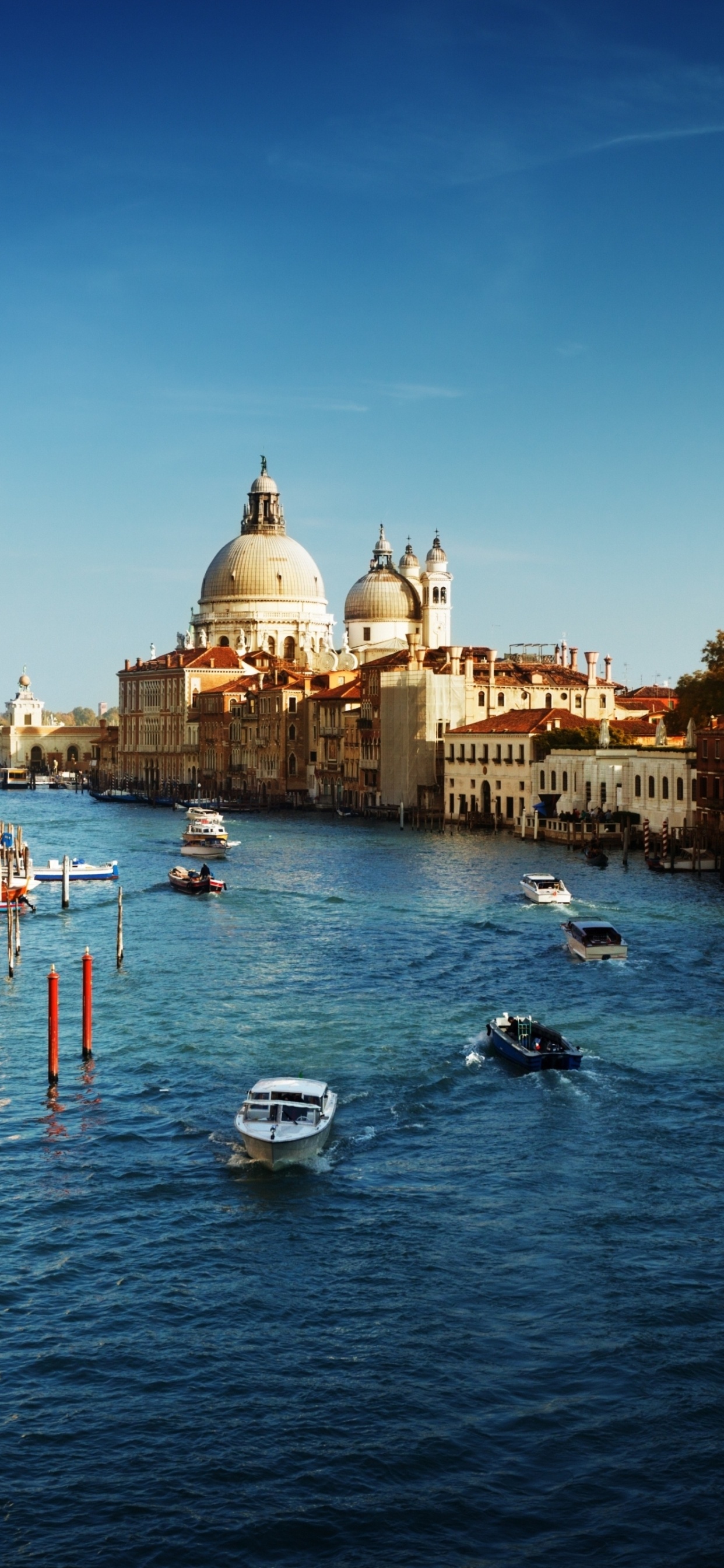 Boats on River Between Buildings During Daytime. Wallpaper in 1242x2688 Resolution