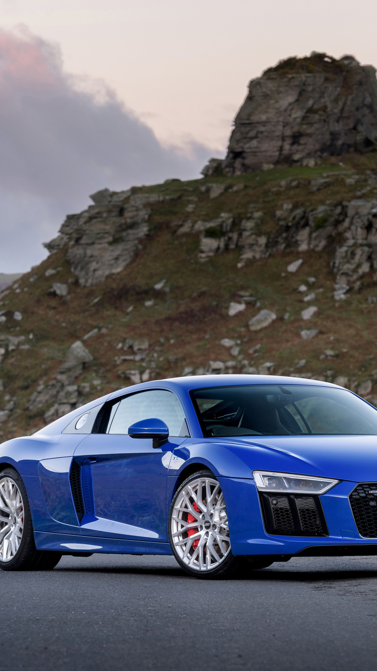 Blaues Bmw m 3 Coupe Auf Grauem Felsigen Berg Tagsüber During. Wallpaper in 750x1334 Resolution