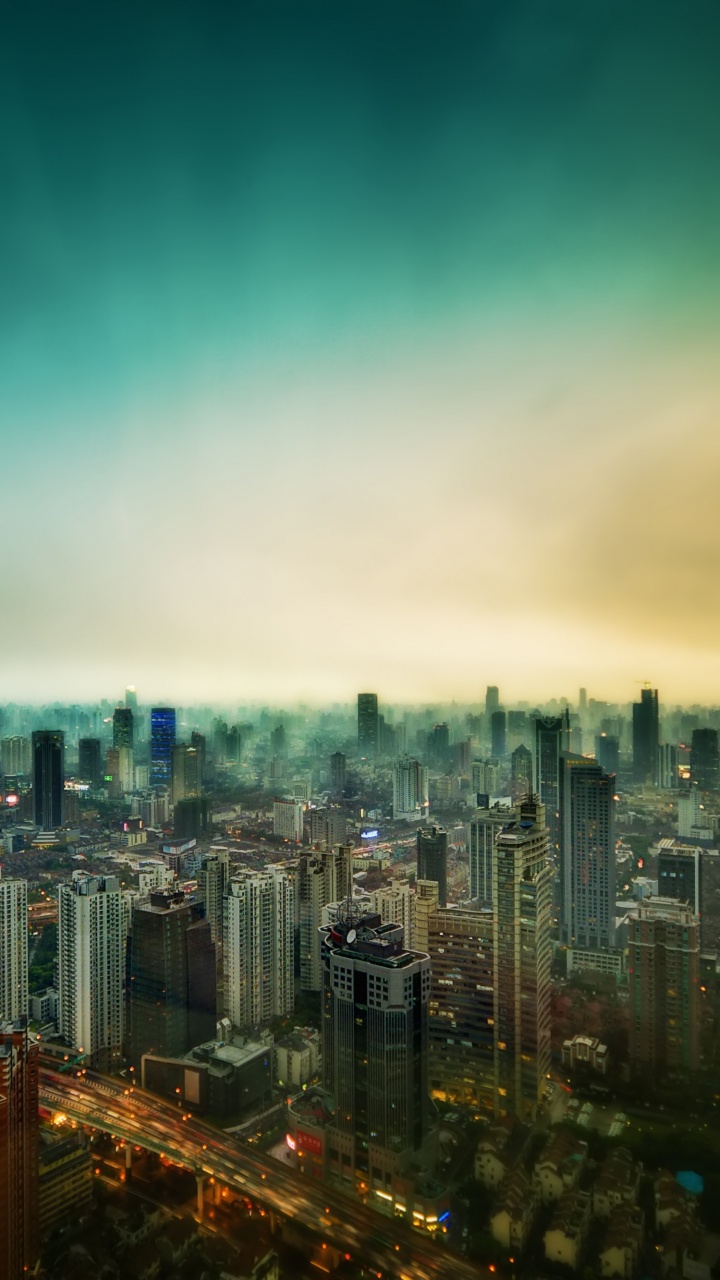 City Skyline During Night Time. Wallpaper in 720x1280 Resolution