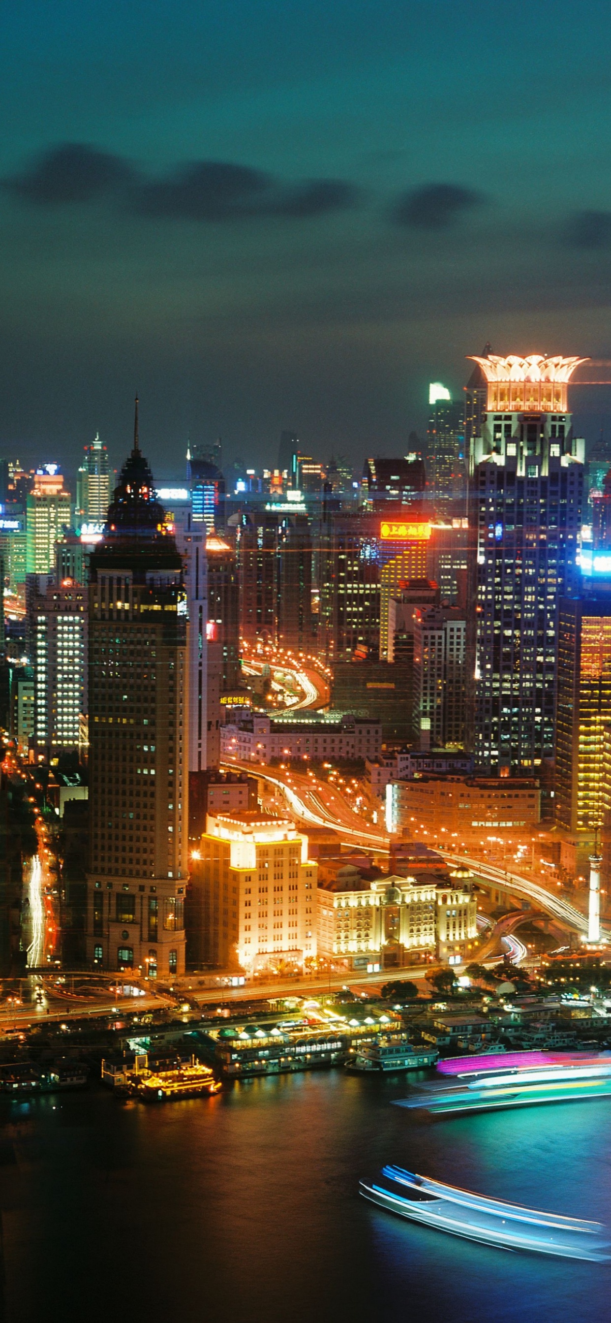 City Skyline During Night Time. Wallpaper in 1242x2688 Resolution