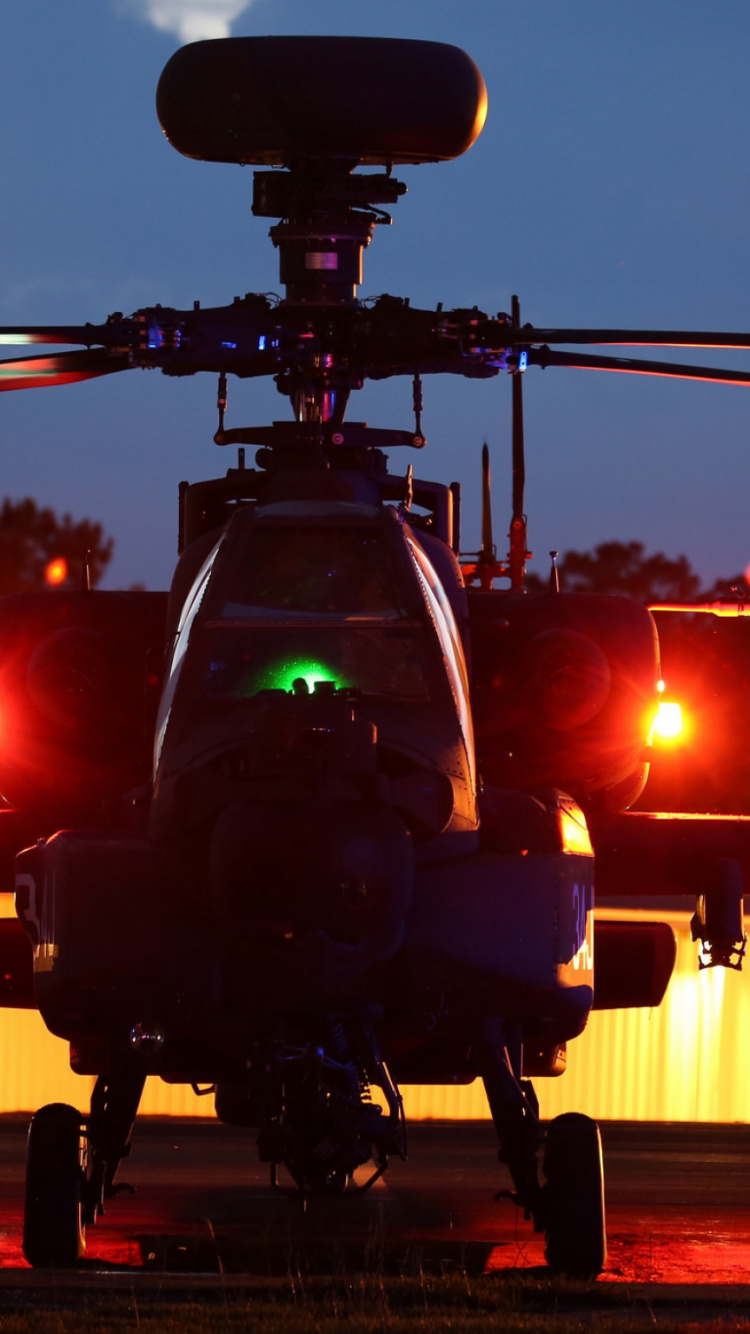 Black and Green Helicopter on a City Street During Daytime. Wallpaper in 750x1334 Resolution