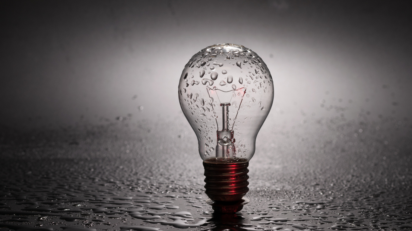 Water Drop on Clear Glass Light Bulb. Wallpaper in 1366x768 Resolution