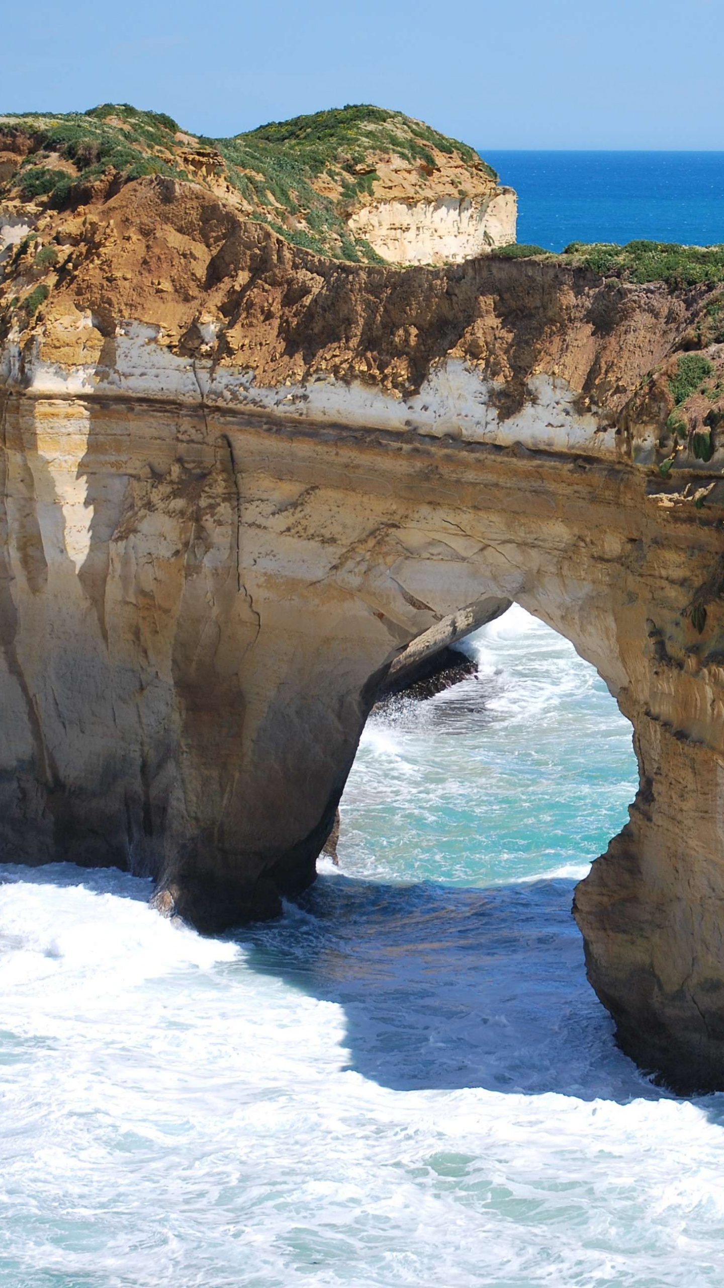 Brown Rock Formation on Sea During Daytime. Wallpaper in 1440x2560 Resolution