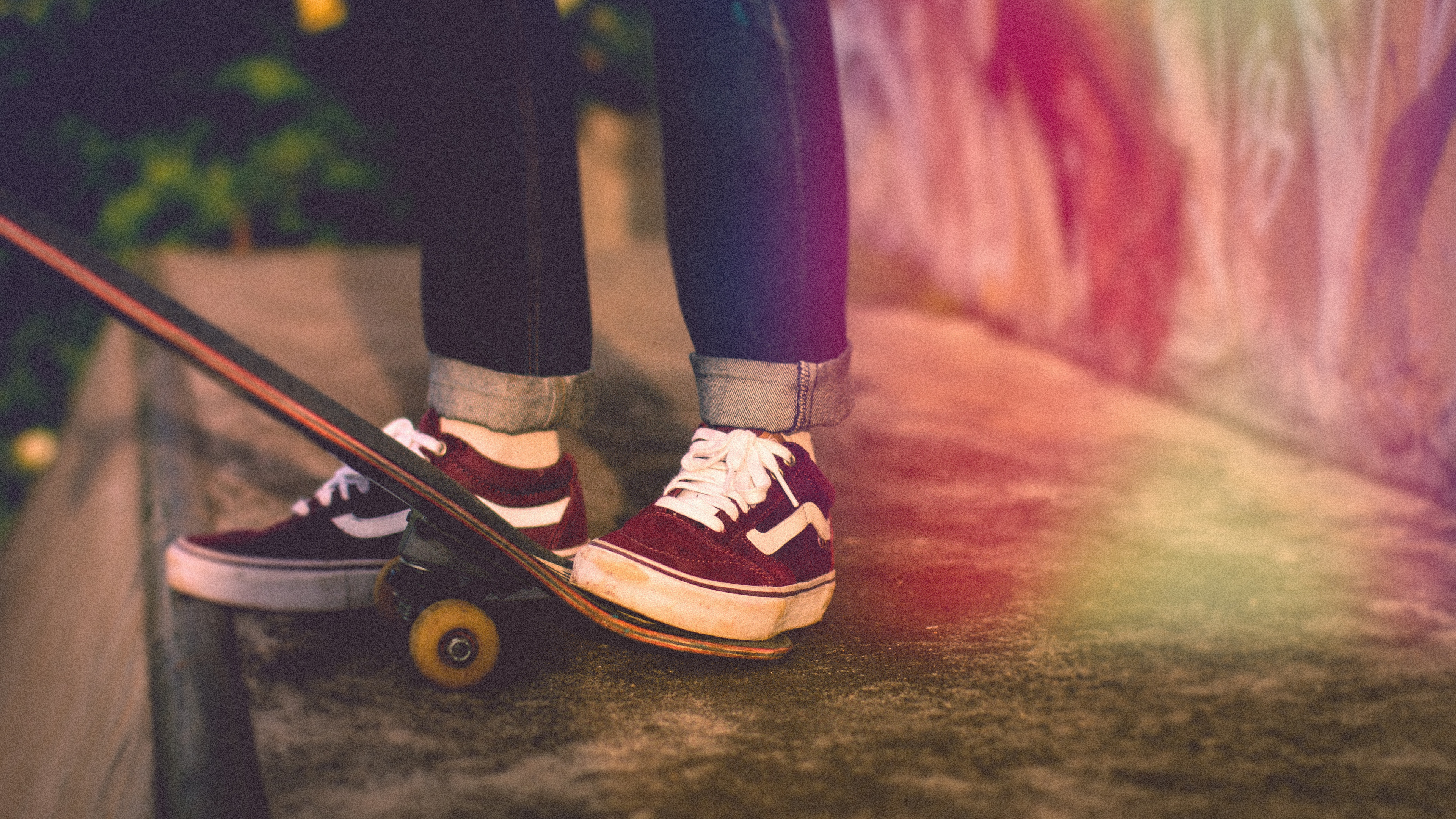 Person in Black Pants and Red and White Sneakers Standing on Black Concrete Floor. Wallpaper in 3840x2160 Resolution