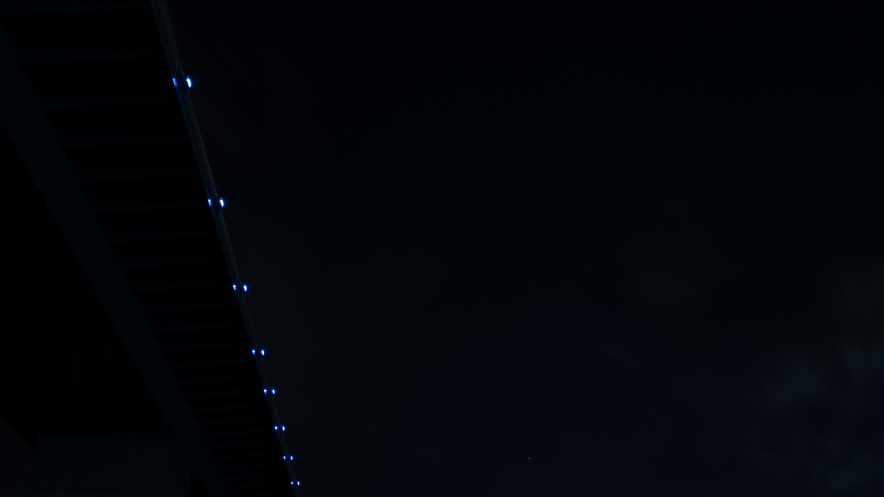 White and Black Bridge Under Dark Sky. Wallpaper in 1280x720 Resolution