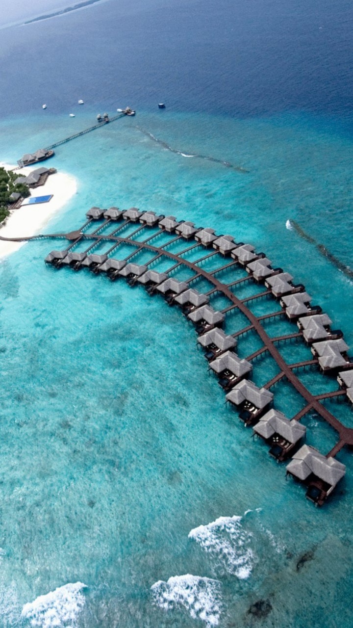 Vue Aérienne de la Mer Bleue Pendant la Journée. Wallpaper in 720x1280 Resolution