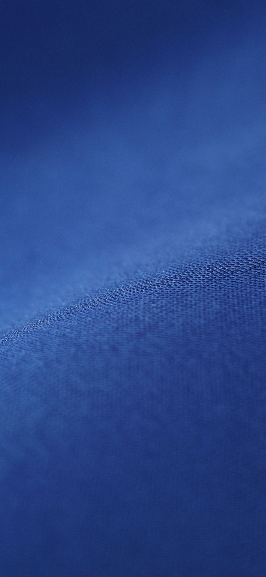 Blue Textile in Close up Photography. Wallpaper in 1125x2436 Resolution