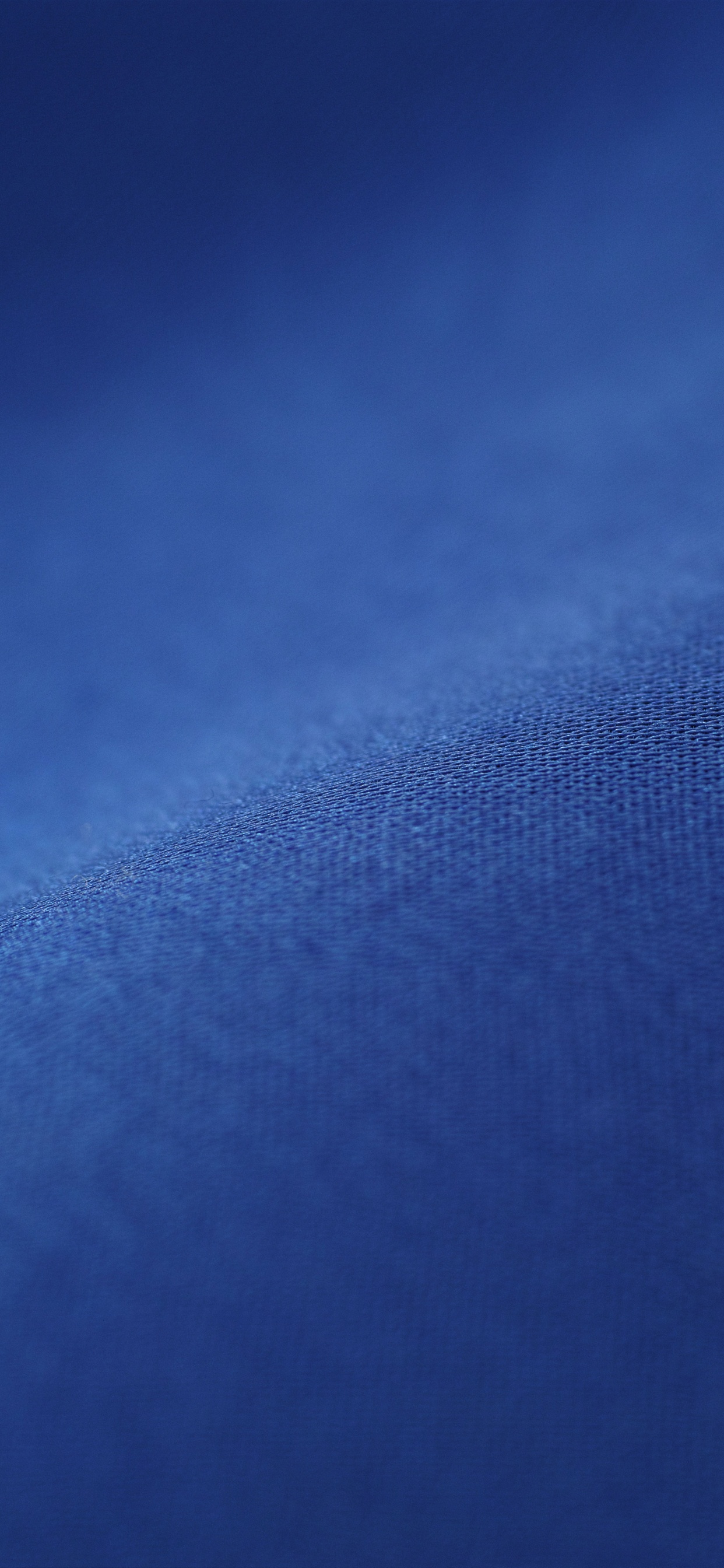 Blue Textile in Close up Photography. Wallpaper in 1242x2688 Resolution