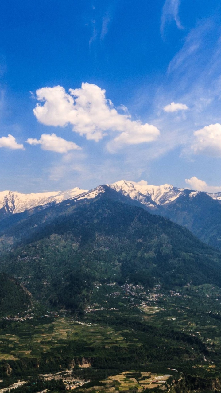 Green Mountains Under Blue Sky During Daytime. Wallpaper in 720x1280 Resolution
