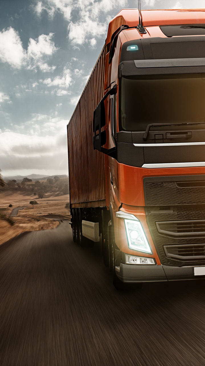 Braun-weißer LKW Tagsüber Unterwegs. Wallpaper in 720x1280 Resolution