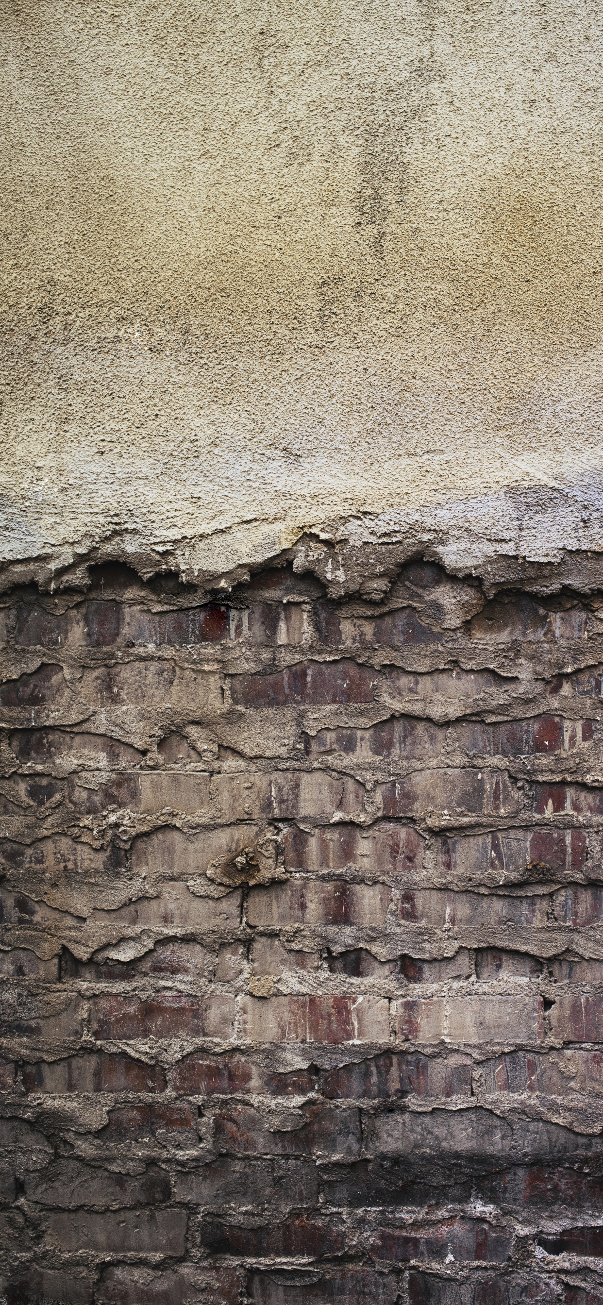 Braune Und Graue Backsteinmauer. Wallpaper in 1242x2688 Resolution