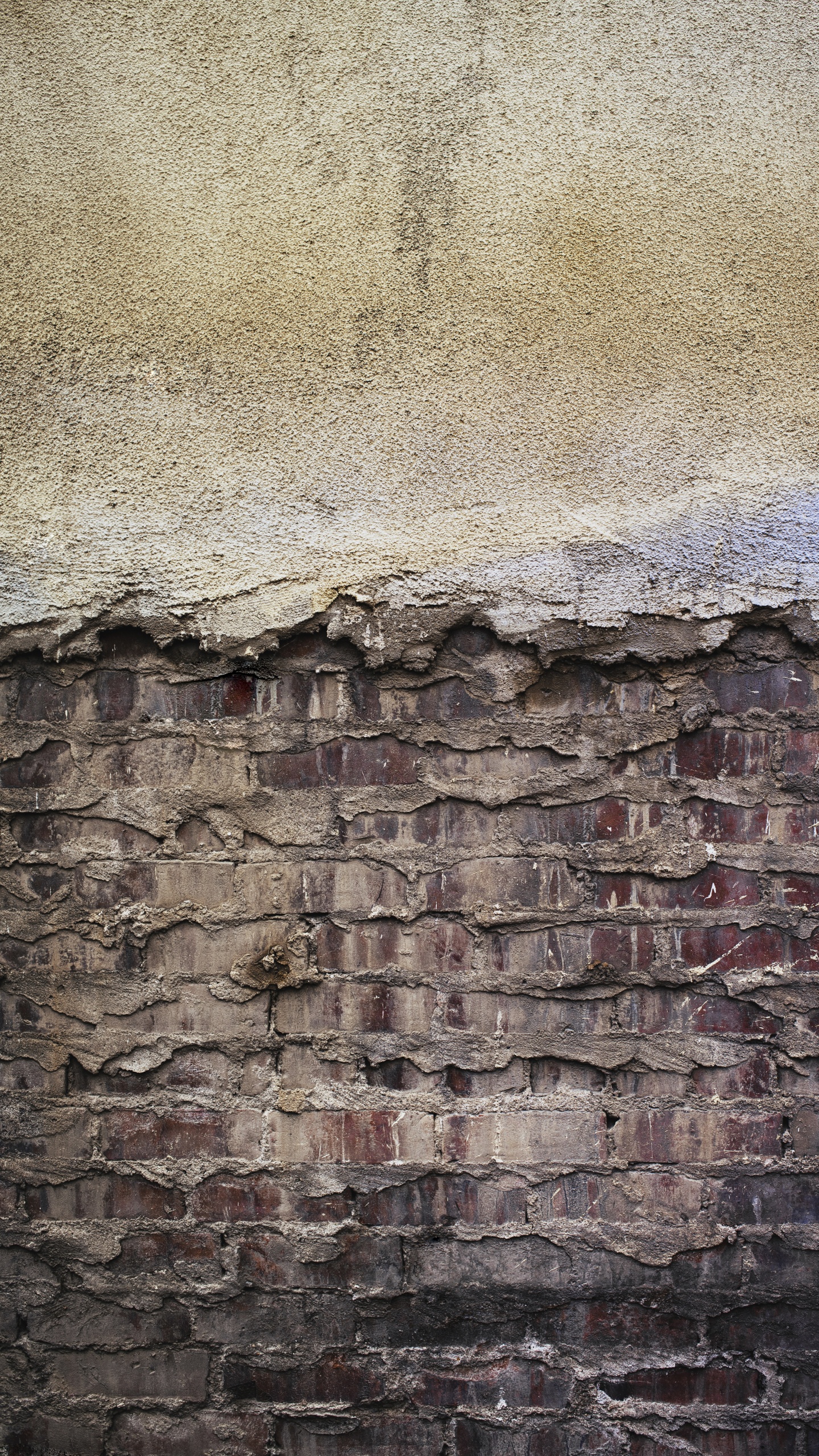 Braune Und Graue Backsteinmauer. Wallpaper in 1440x2560 Resolution