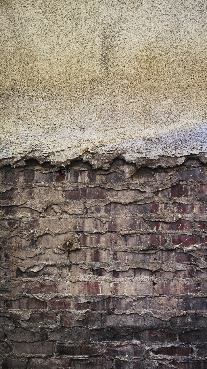 Braune Und Graue Backsteinmauer. Wallpaper in 720x1280 Resolution