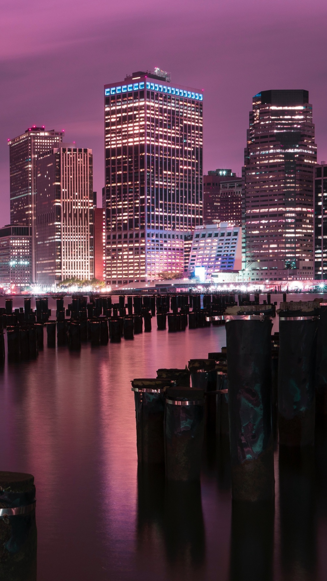 City Skyline Across Body of Water During Night Time. Wallpaper in 1080x1920 Resolution