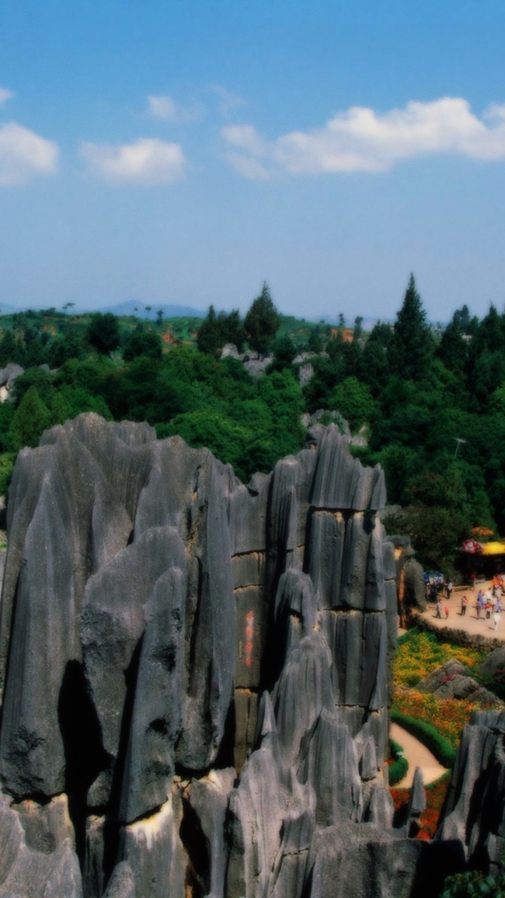 Gray Rock Formation Under Blue Sky During Daytime. Wallpaper in 720x1280 Resolution
