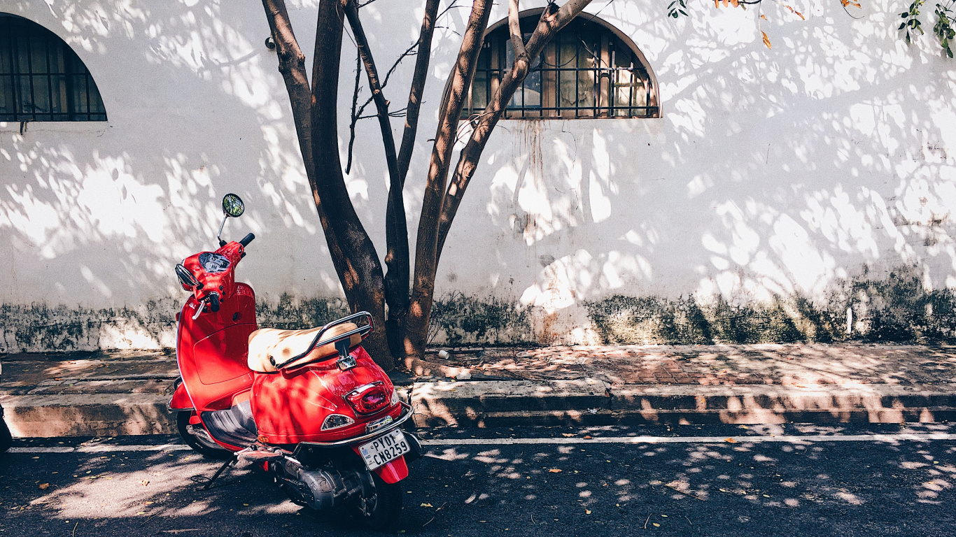 Man in Red Jacket Riding Red Motor Scooter on Road During Daytime. Wallpaper in 1366x768 Resolution