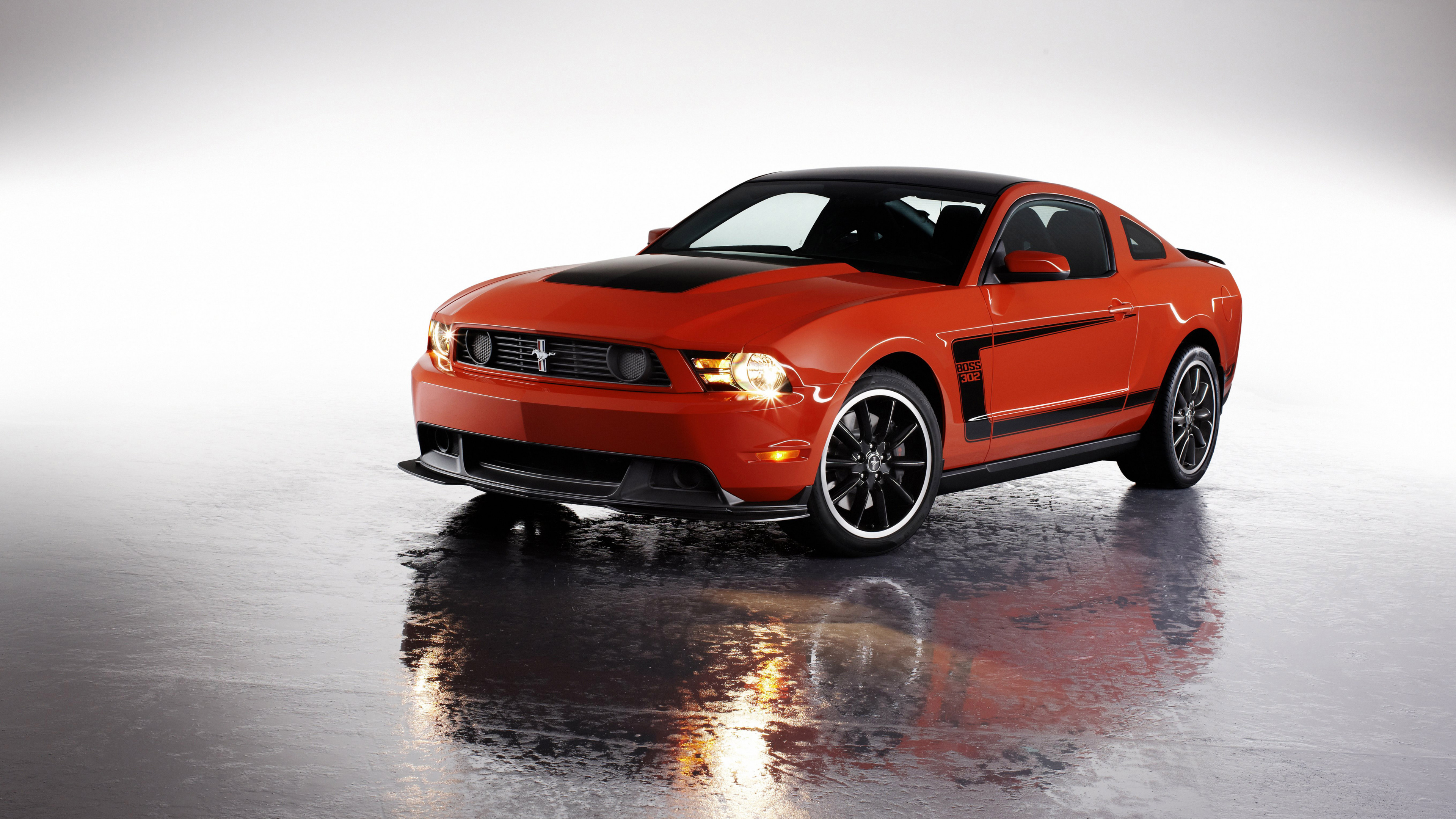 Orange Bmw m 3 Coupe on Snow Covered Ground. Wallpaper in 3840x2160 Resolution